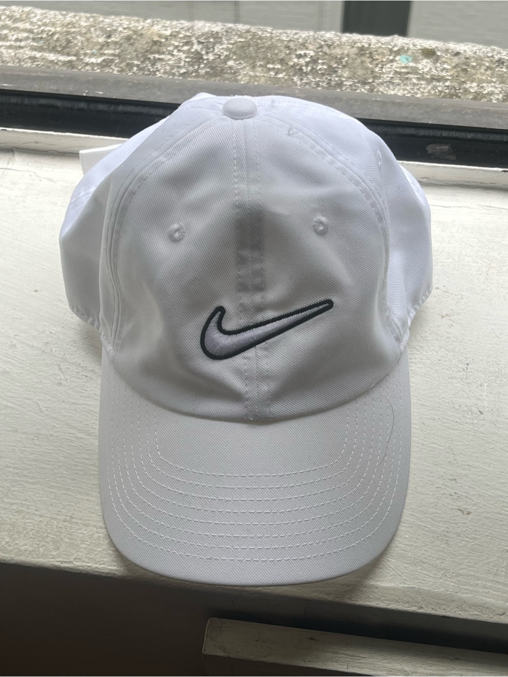Nike White Cap with Black Swoosh - size S/M